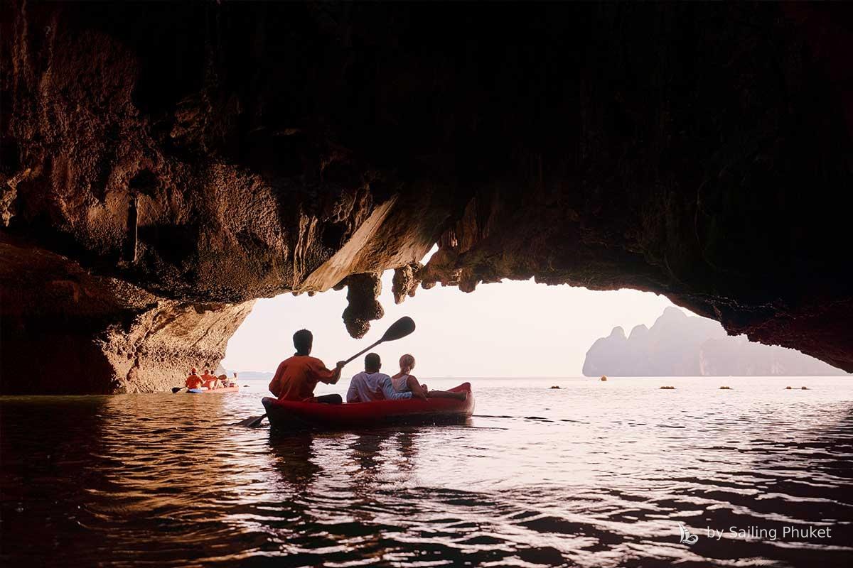 Kayak entering a sea cave, Phang Nga Bay