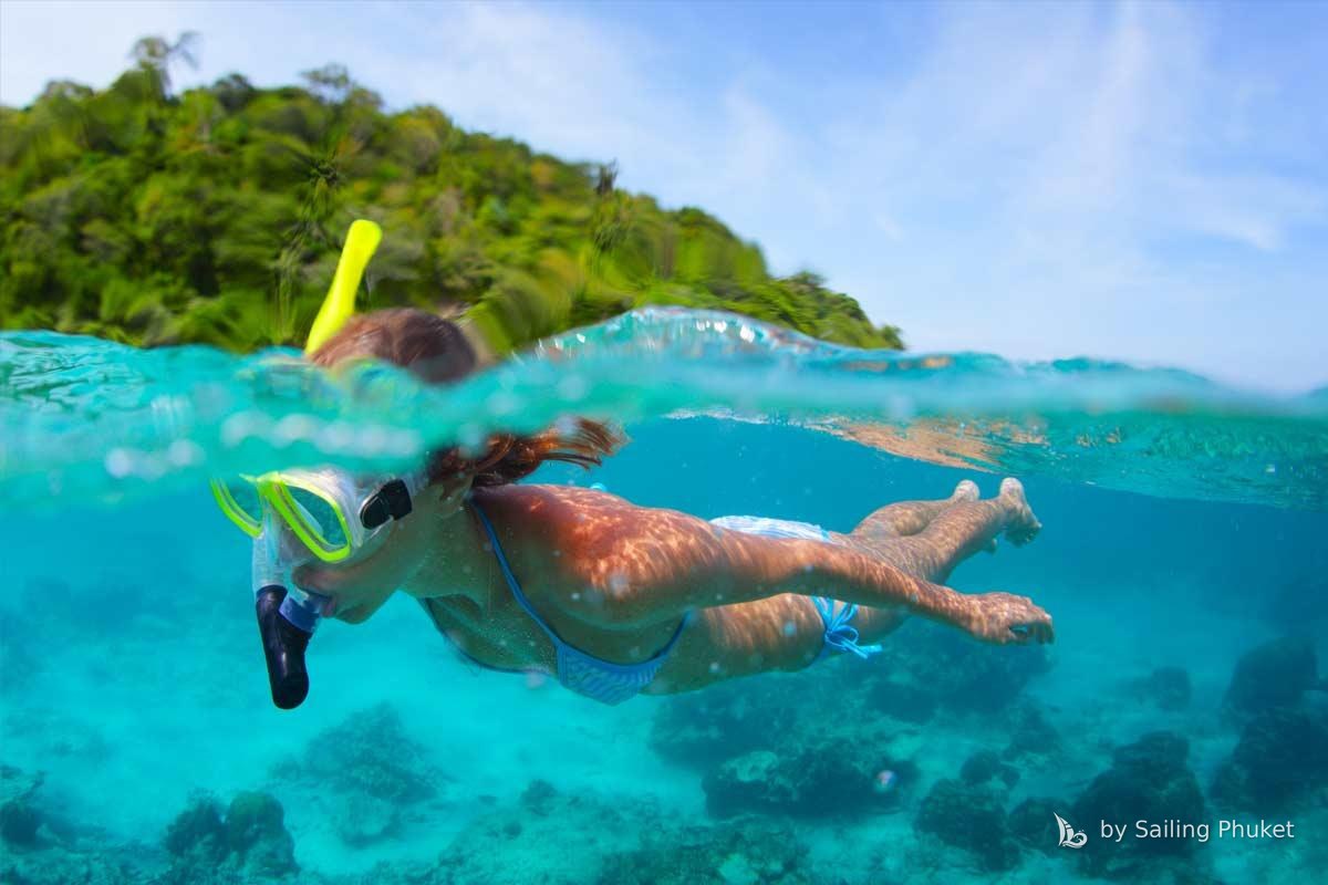 Snorkelling in clear water off Racha Yai